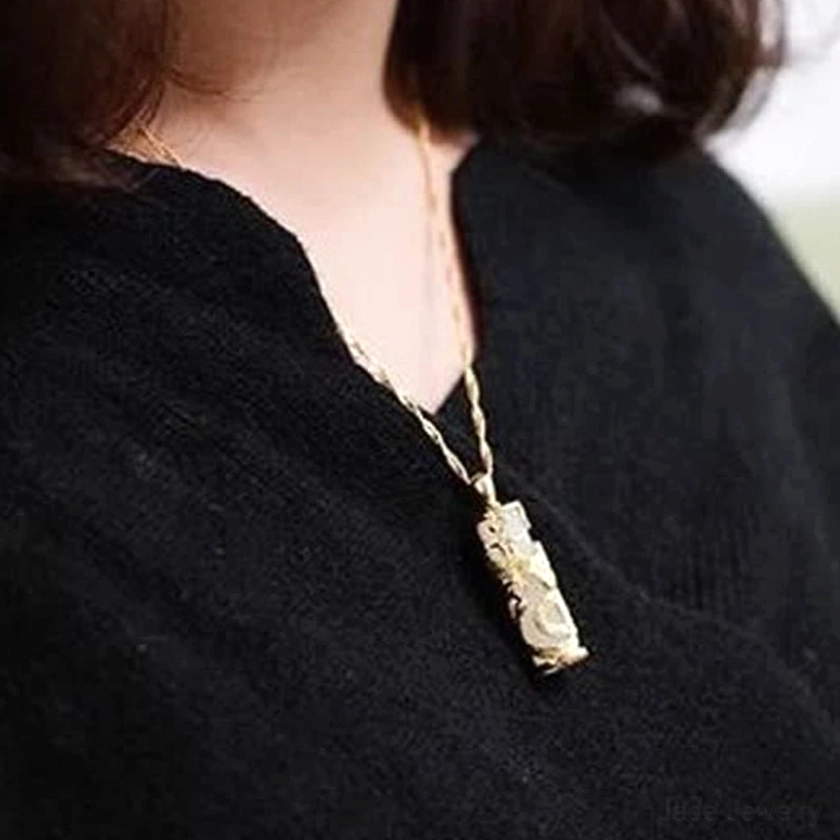 White jade dragon phoenix harmony necklace pendant artistic lifestyle photograph, worn styling and spiritual aesthetic