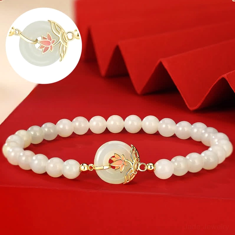 Complete hetian white jade lotus peace buckle bracelet flat lay with close-up inset of ornate lotus charm detail