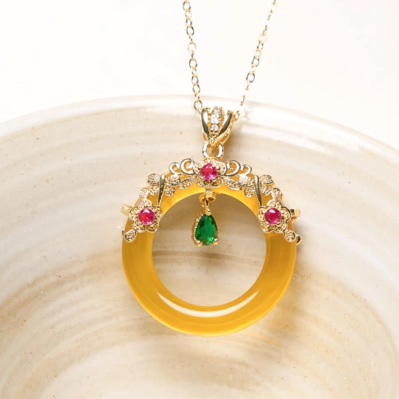 Yellow chalcedony peace buckle pendant with gold ornate frame